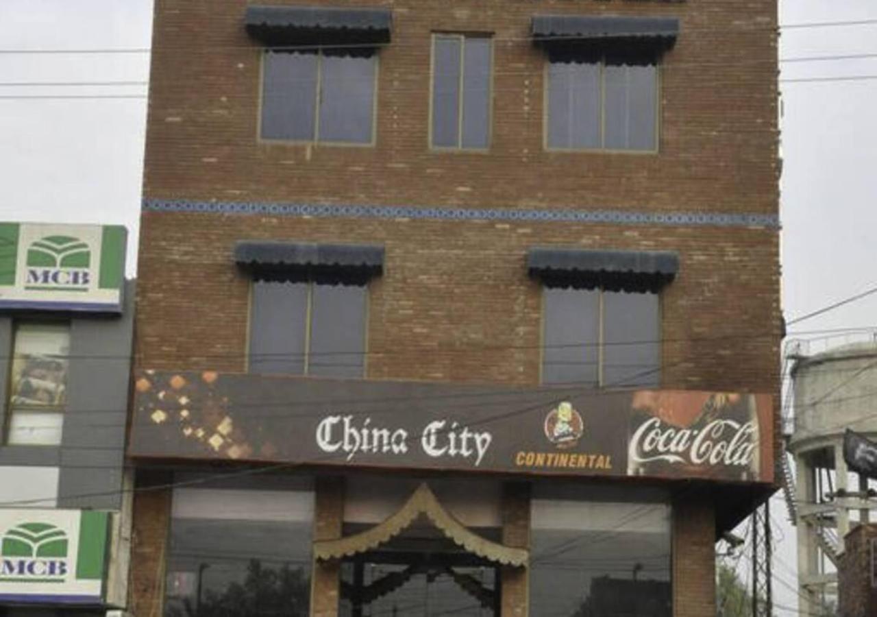 Rajone Hotel Faisalabad Exteriör bild